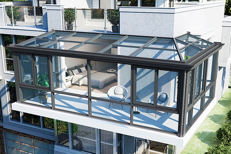 Sleek Sunroom Design: Floor to Ceiling Glass for a Minimalist Home