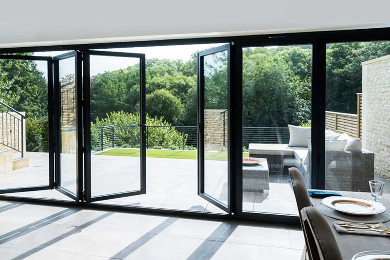 Contemporary Bifold Doors: Kitchen Extension and Patio Use