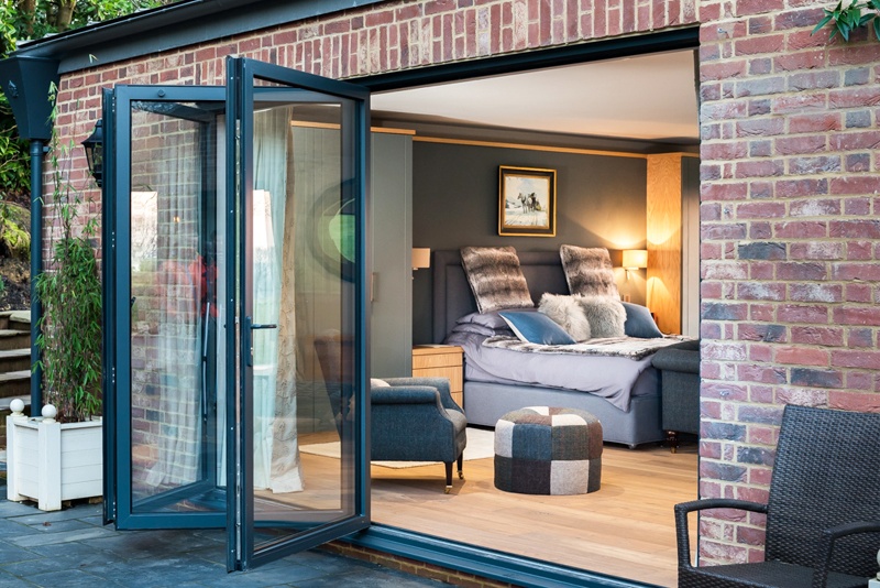 Four Seasons of Living: How Folding Glass Patio Doors Connect You with Nature Year-Round